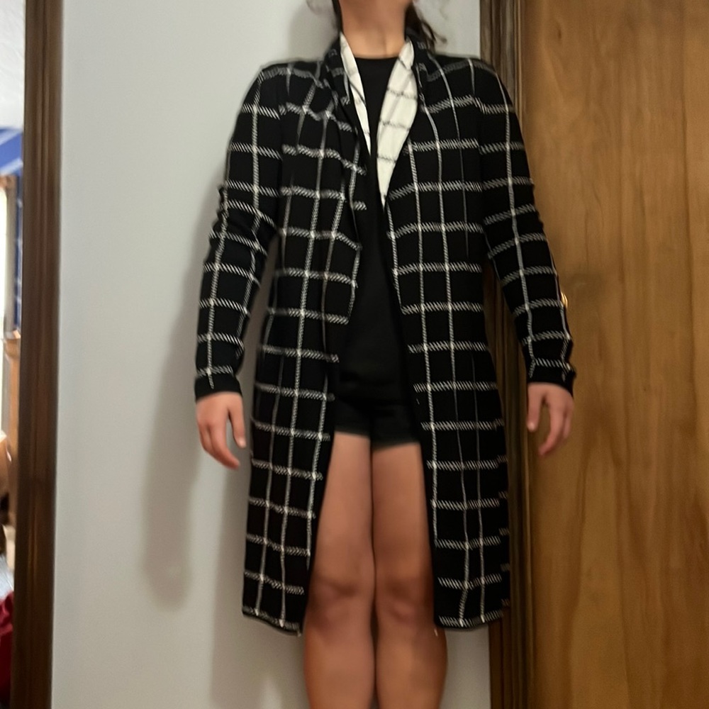 Longer length black/white pattern cardigan. Size M